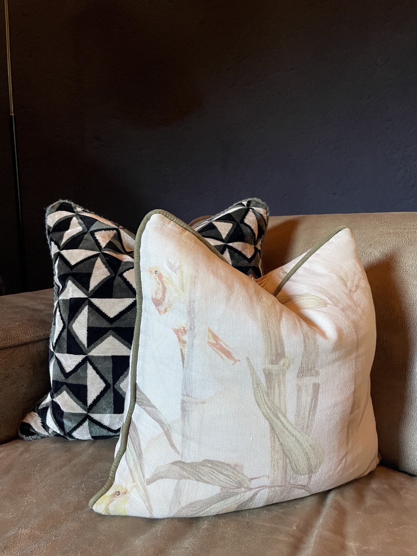 Bespoke scatter cushions on a leather sofa